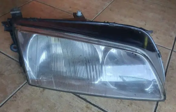 Mazda 626 Headlight/headlamp 1306235351