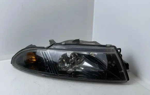 Mitsubishi Carisma Headlight/headlamp 15157800