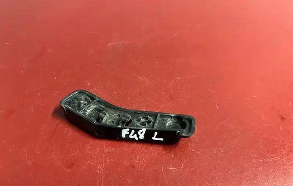 Front bumper mounting bracket