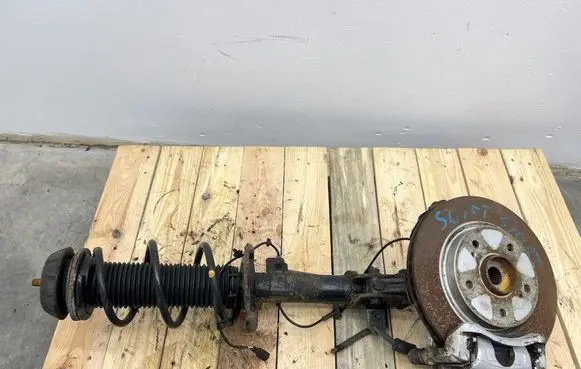 Suzuki Swift II Front shock absorber with coil spring 4160270L00
