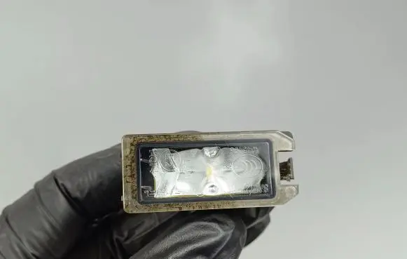 Jeep Grand Cherokee Number plate light 68228927AA