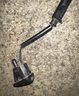 Windshield washer spray nozzle
