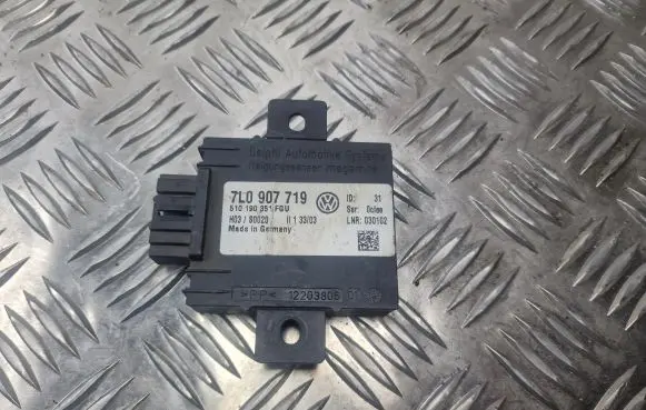 Volkswagen Touareg I Alarm control unit/module 7L0907719