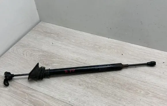 Front door check strap stopper