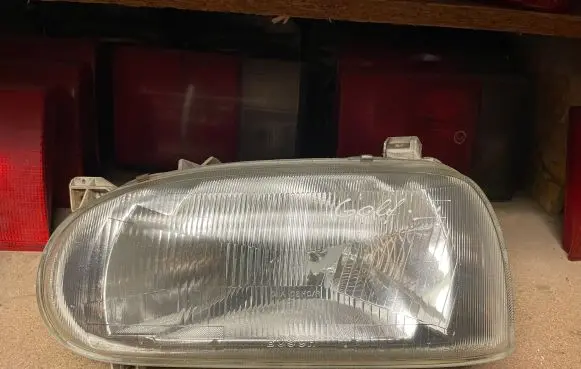 Volkswagen Golf III Headlight/headlamp 0301034311