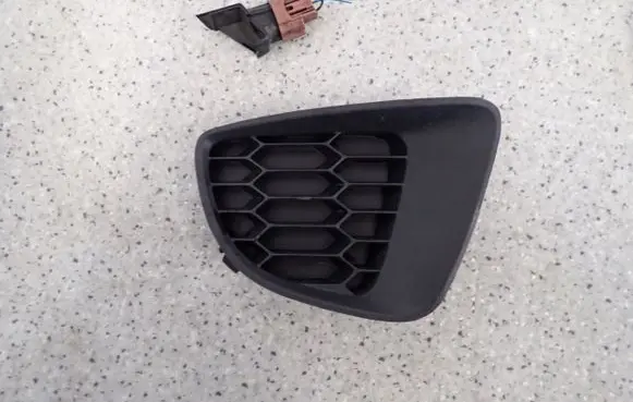 Mazda 2 Front fog light trim/grill 