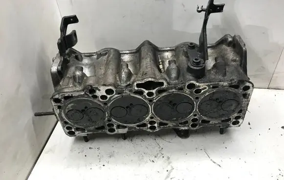 Volkswagen Golf IV Engine head 038103373E