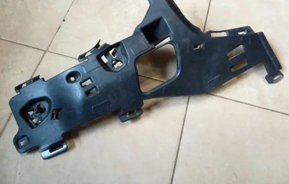 Front bumper mounting bracket