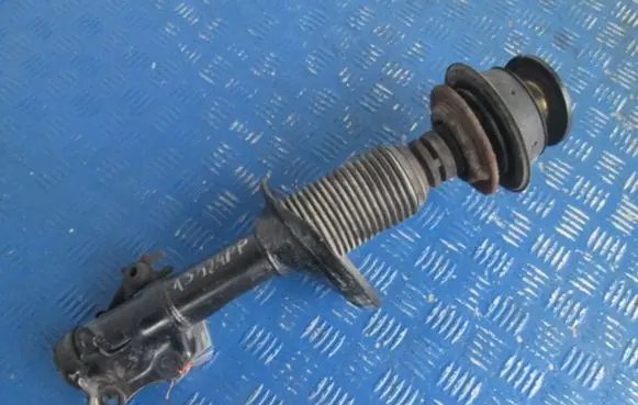 Volkswagen Golf III Front shock absorber with coil spring