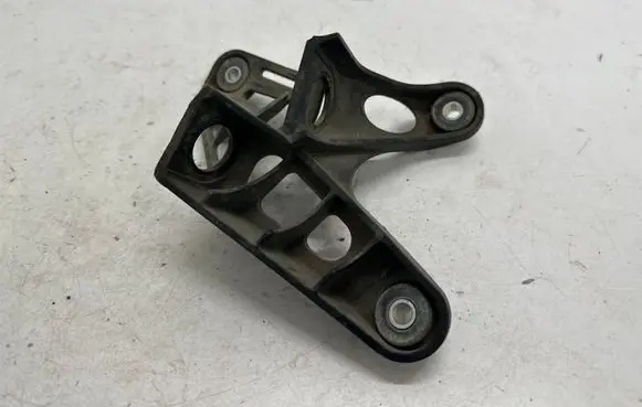 Volkswagen Golf VII Gear shift cable bracket 1K0711789G