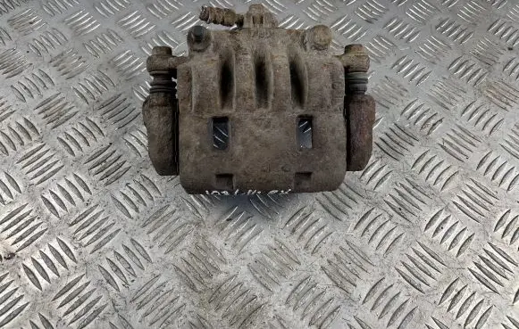 Subaru Impreza III Front brake caliper
