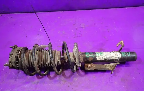 Ford Fiesta Front shock absorber with coil spring 