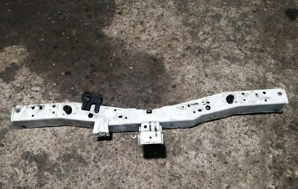 Top upper radiator support slam panel