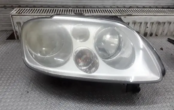 Volkswagen Touran I Headlight/headlamp 1T0941006D