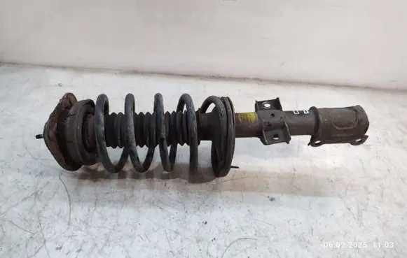 Volvo XC90 Front shock absorber with coil spring 31277877