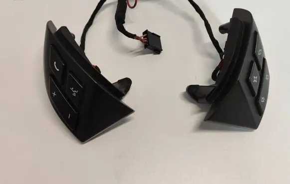 Steering wheel buttons/switches