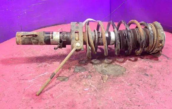 Volkswagen Polo Front shock absorber with coil spring