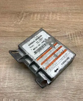 Mazda 323 Airbag control unit/module B01J57K30