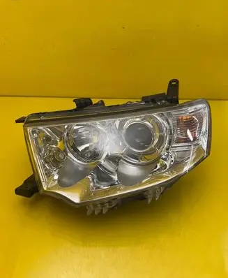 Mitsubishi Pajero Sport I Headlight/headlamp