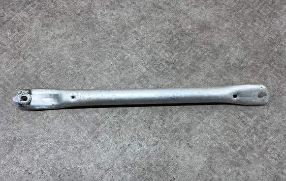 Radiator support slam panel bracket