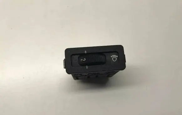 Headlight level height control switch