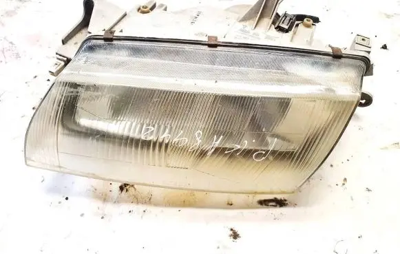 Mazda 323 Headlight/headlamp 1305235336