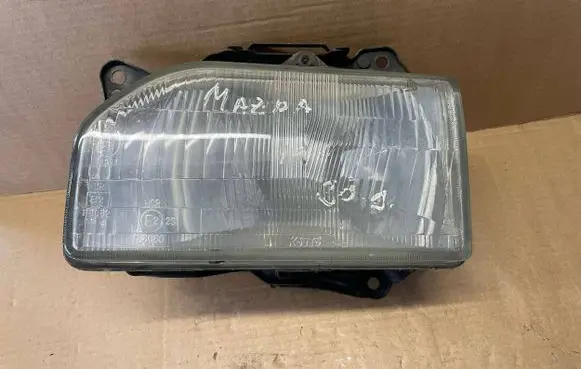 Mazda 121 Headlight/headlamp 11061238