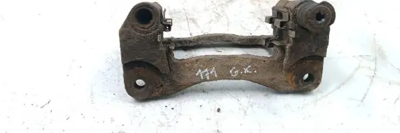Subaru Legacy Brake caliper pad carrier rear 