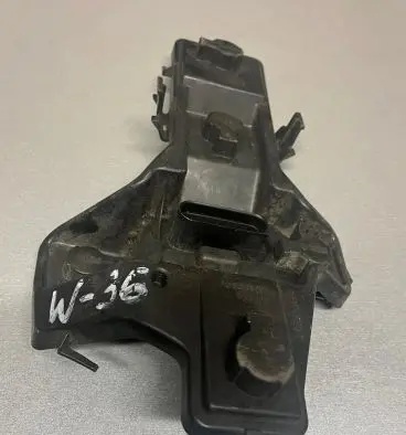 Tail light bulb cover holder