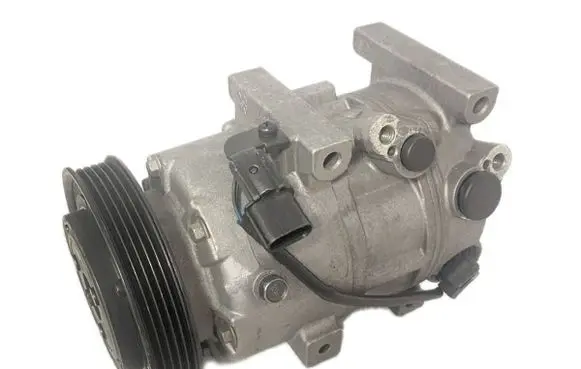 KIA Carens III Air conditioning (A/C) compressor (pump) 97701A4500 8623374 97701-A4500