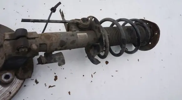 Front shock absorber with coil spring