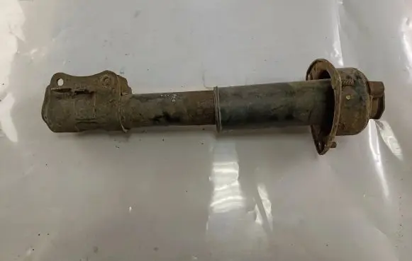 Suzuki Grand Vitara I Front shock absorber/damper