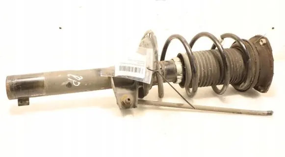 Volkswagen Golf VII Front shock absorber with coil spring 5Q0413023GP