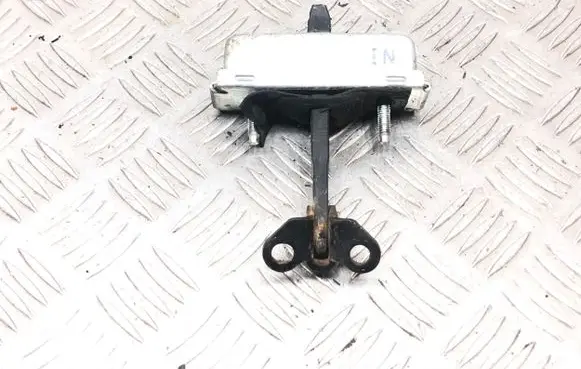 Front door check strap stopper