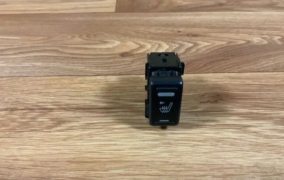 Nissan Note (E11) Seat heating switch 