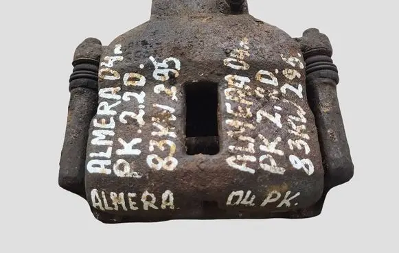 Nissan Almera N16 Front brake caliper