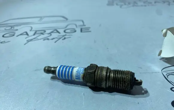 Ford Fiesta I Spark plug 87YF12405AE 1216460