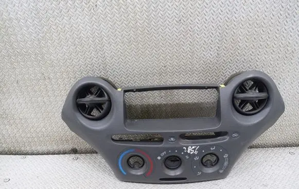 Toyota Yaris Dash center air vent grill 758268701D