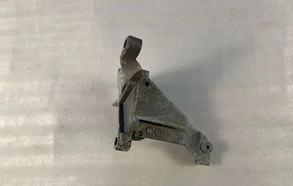 Subaru Crosstrek II A/C compressor mount bracket 73611FL130