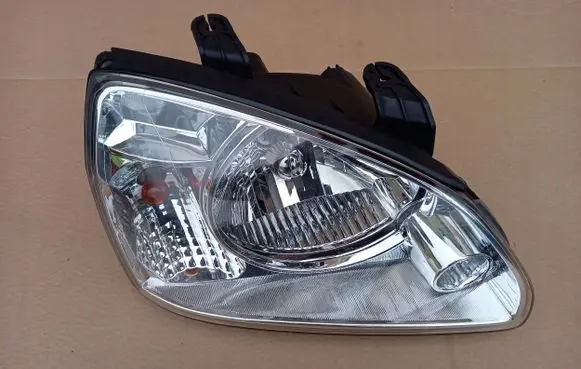KIA Carens I Headlight/headlamp