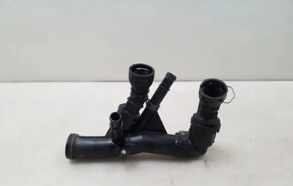 Thermostat/thermostat housing