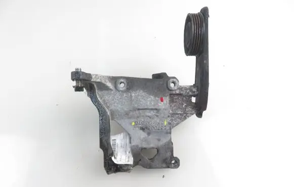 Subaru Legacy A/C compressor mount bracket 73611AE070