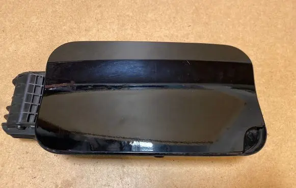 Fuel tank cap lock
