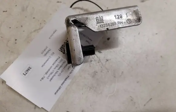 Opel Astra J Headlight/headlamp mounting bracket 13256261
