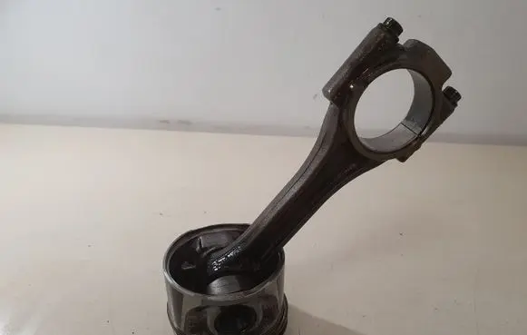 Piston with connecting rod
