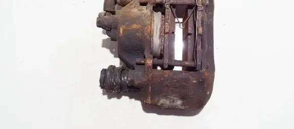 Mazda 323 F Front brake caliper