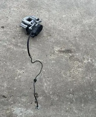 Opel Astra L Rear brake caliper AE777007