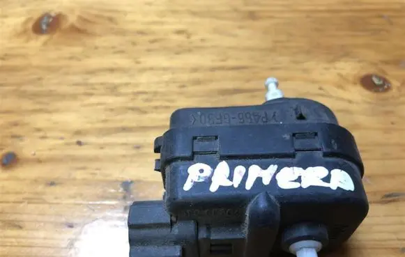 Nissan Primera Headlight level adjustment motor 