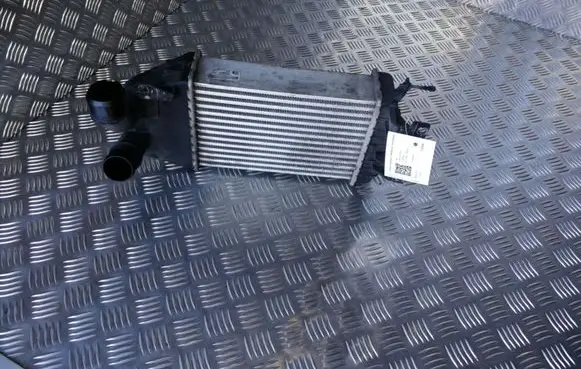 Opel Zafira B Intercooler radiator 13240831