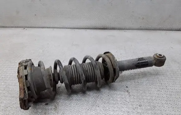 Nissan Almera N16 Rear shock absorber with coil spring 